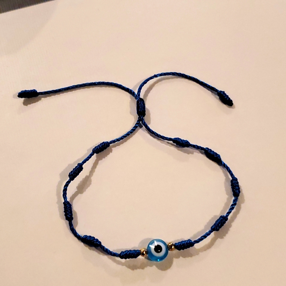 7 knot evil eye adjustable blue string bracelet